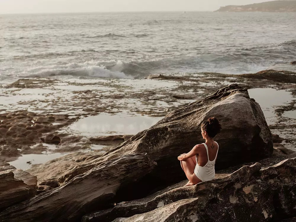 meditating by the sea